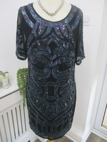 Frock and frill - and,